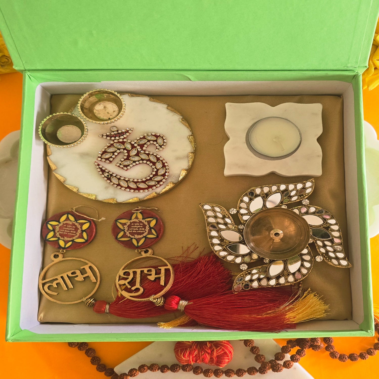 Marble Round Pooja Platter , Marble Floral TeaLight , Brass Swastik Diya and Blue Pottery Door Hangings