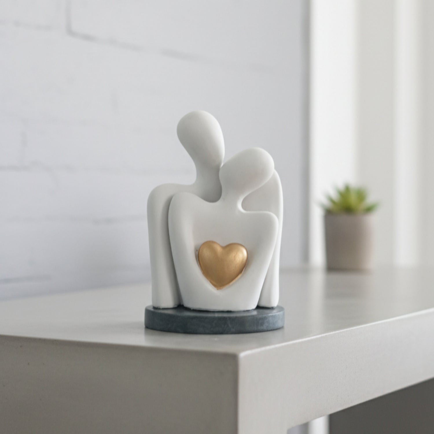 Abstract Couple Figurine with Golden Heart